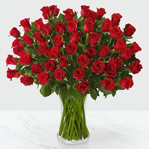 Red Roses in Glass Vase